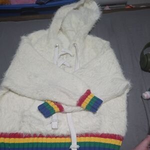 Cozy Cream Sweater with Rainbow Accents
